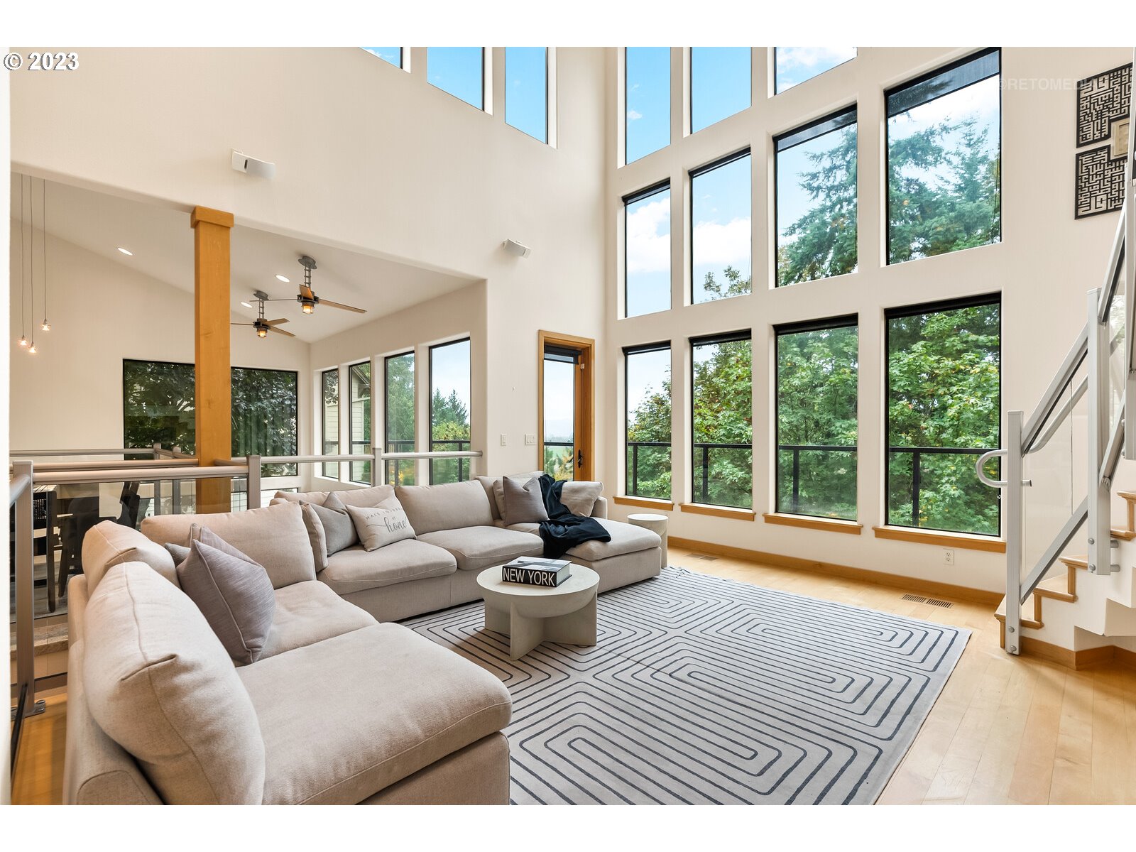 3236 Ridge Pointe Drive Forest Grove, OR 97116 - Photo 5 of 47 a living room with furniture and large windows