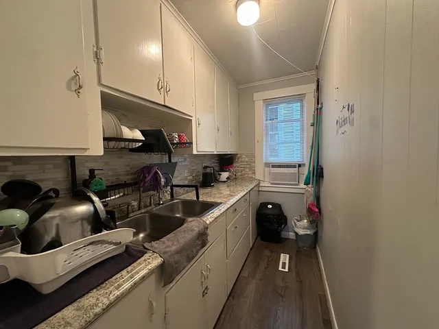 a view of a kitchen with appliances and cabinets