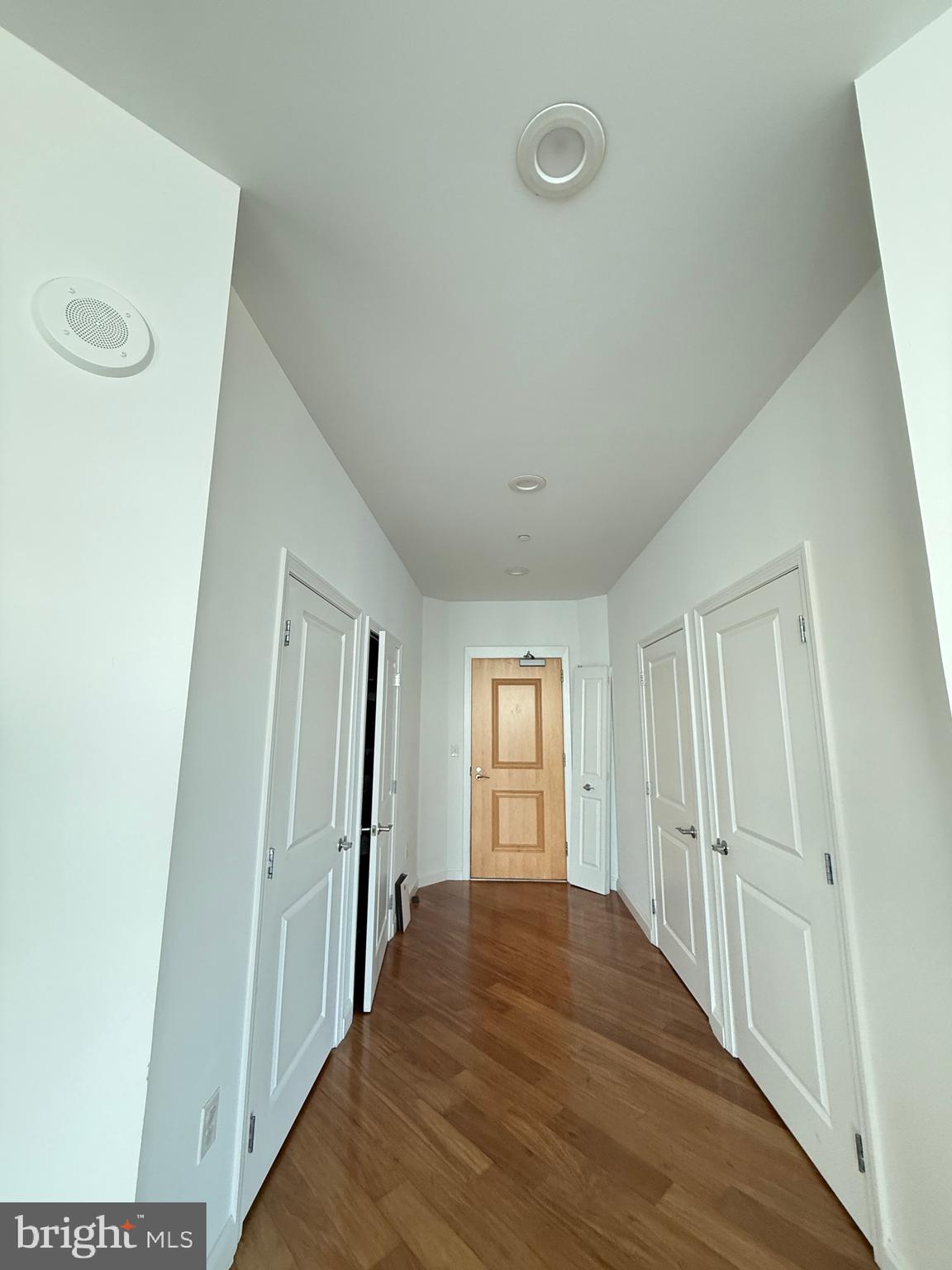 901 North Penn Street, Unit R2101 Philadelphia, PA 19123 - Photo 31 of 33 a view of empty room with wooden floor and fan