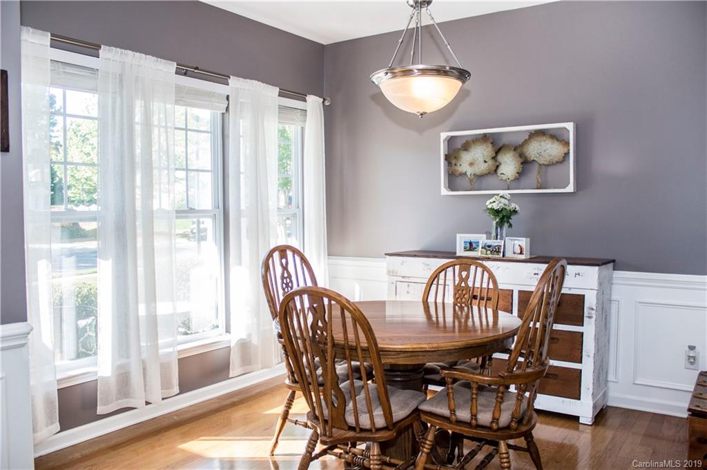 281 Sand Paver Way Fort Mill, SC 29708 - Photo 5 of 30 a view of a dining room with furniture window and wooden floor