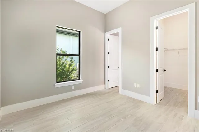 a spacious bathroom with a double vanity sink mirror and double
