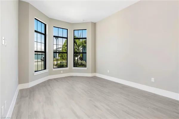 a bathroom with a double vanity sink toilet and shower