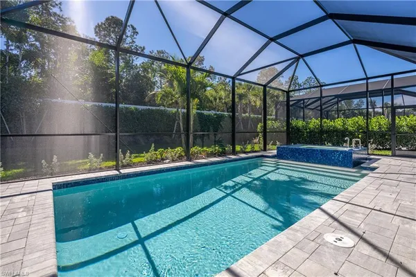 a view of a chairs and table in the patio