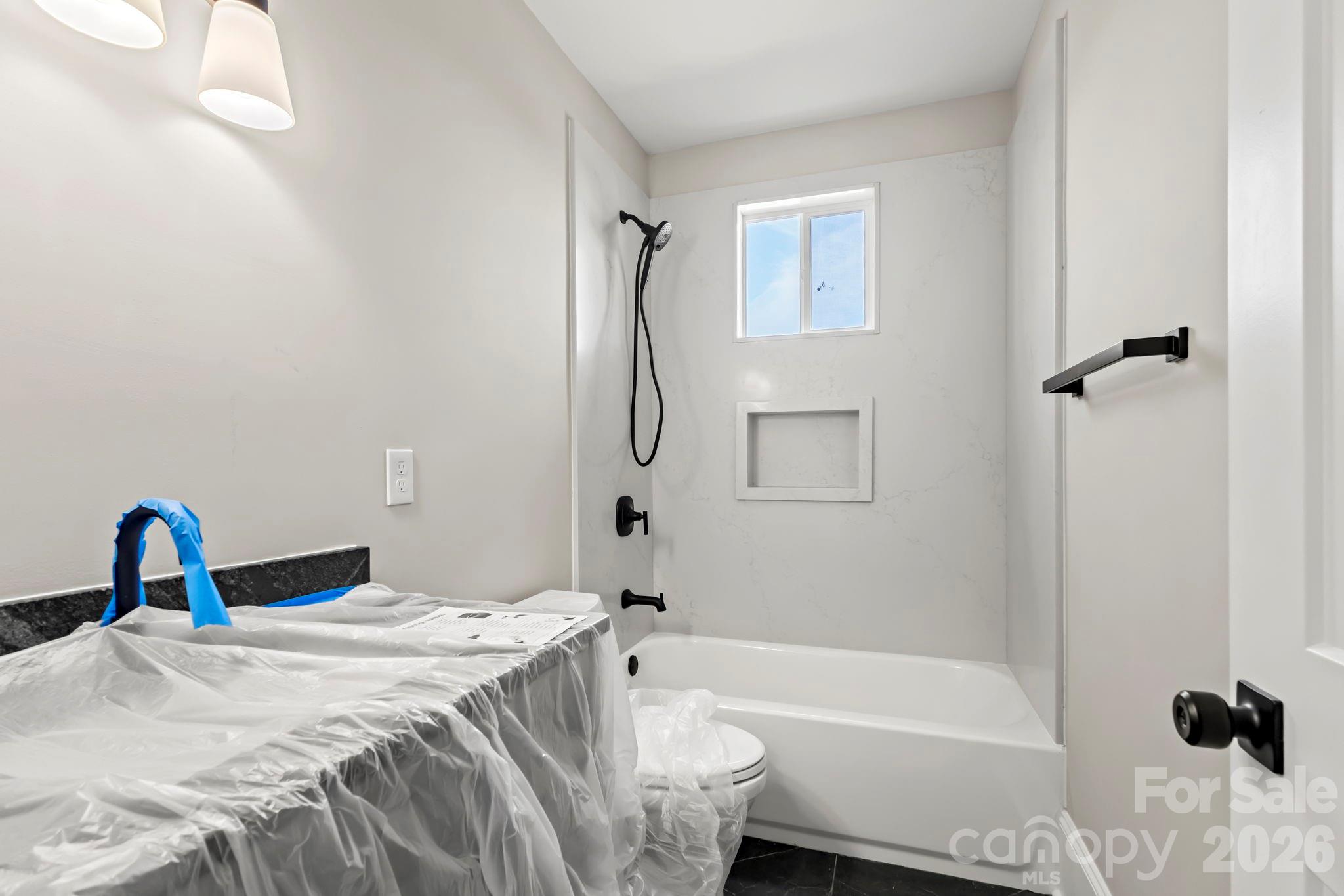 918 North New Hope Road Gastonia, NC 28054 - Photo 33 of 37 a bedroom with a bed and a window