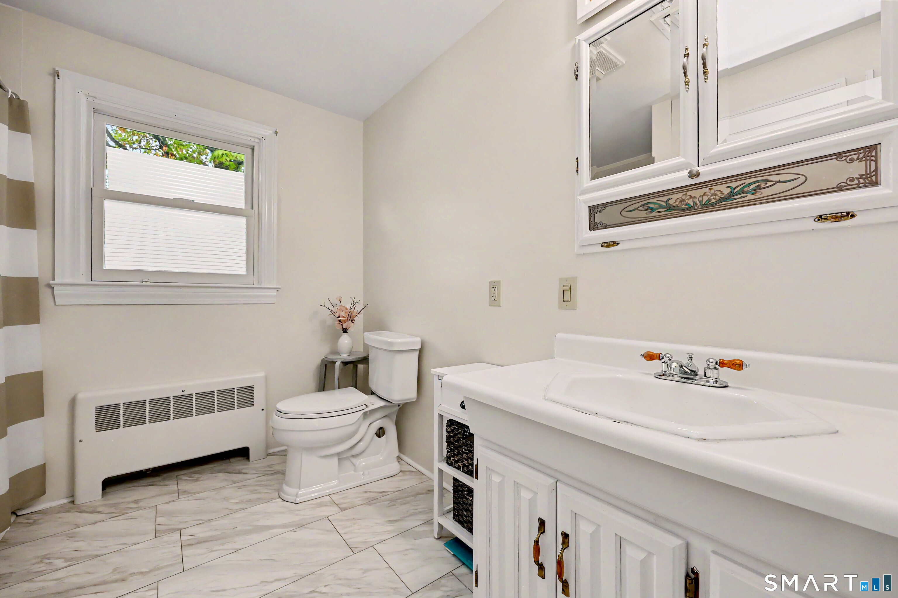 16 Ridgeland Circle Wallingford, CT 06492 - Photo 15 of 30 a bathroom with a sink and a toilet