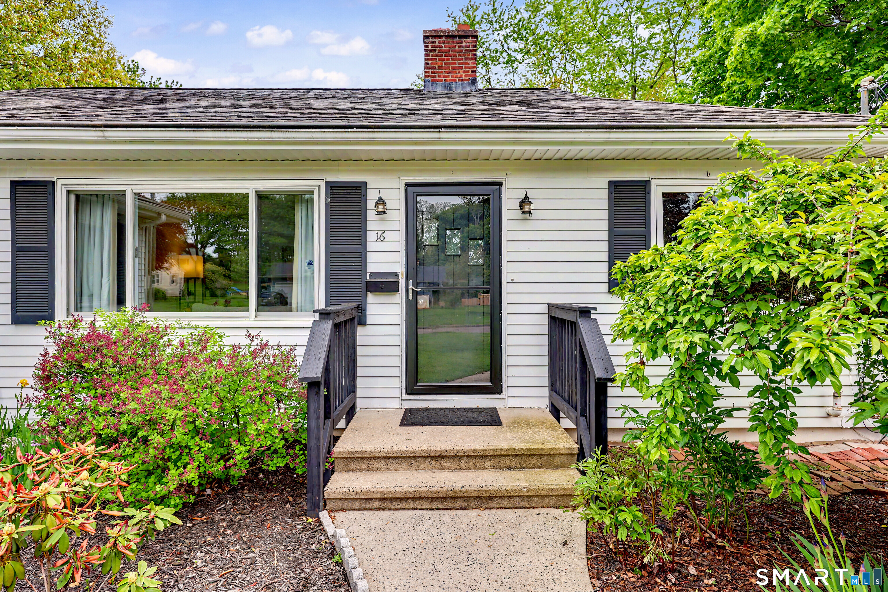 16 Ridgeland Circle Wallingford, CT 06492 - Photo 2 of 30 a front view of a house with garden