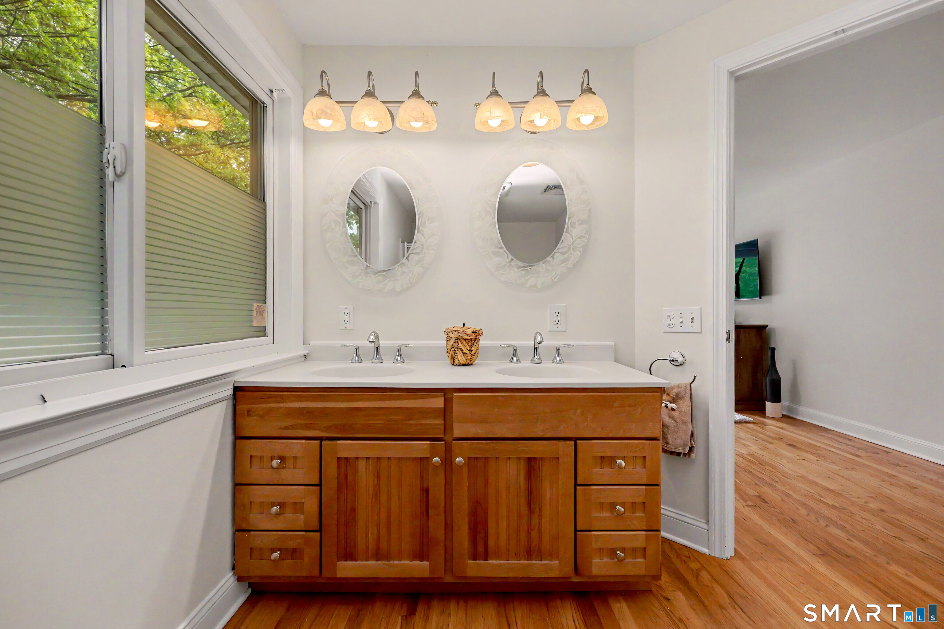 16 Ridgeland Circle Wallingford, CT 06492 - Photo 21 of 30 a bathroom with a sink and a mirror