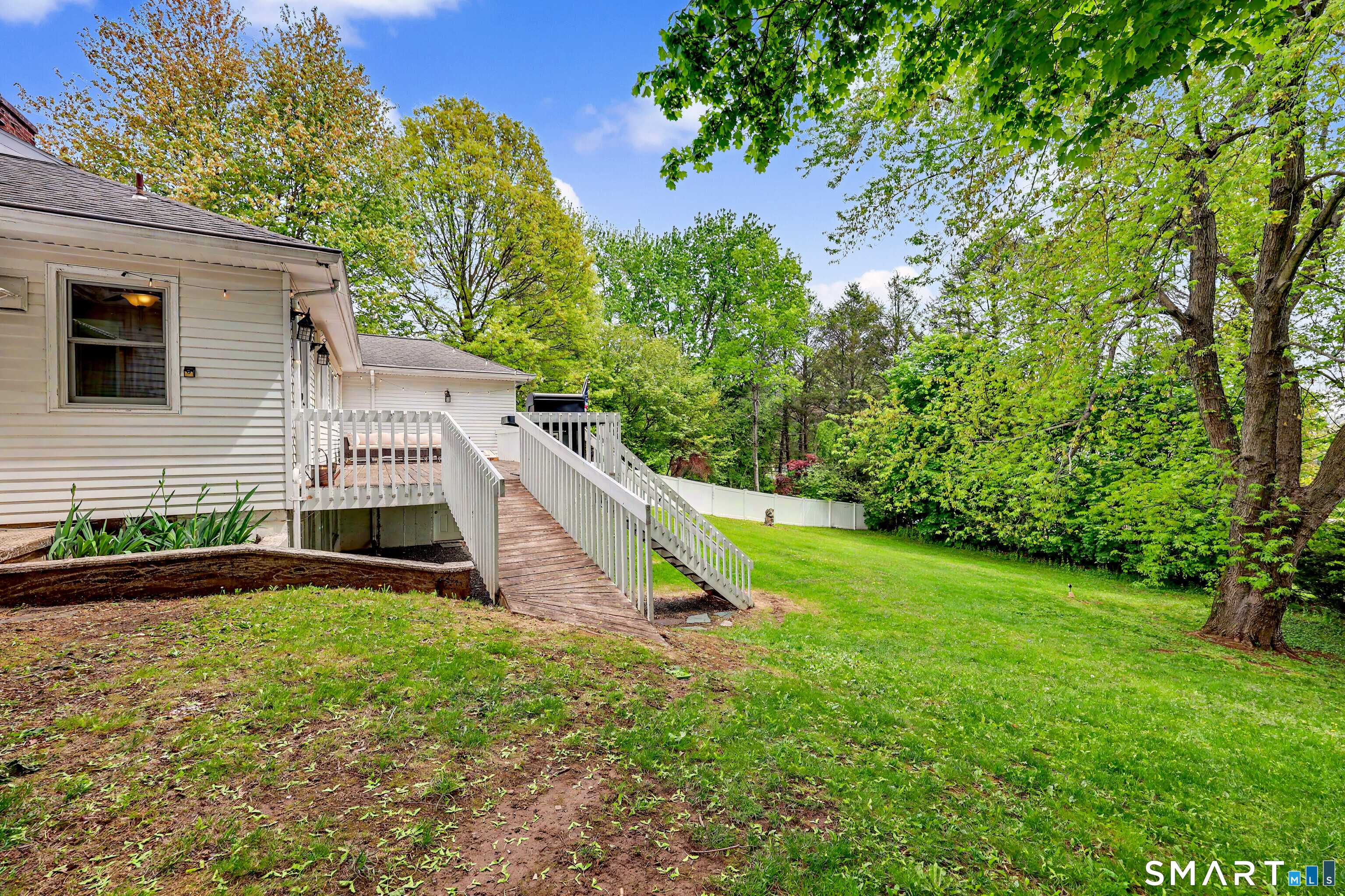 16 Ridgeland Circle Wallingford, CT 06492 - Photo 29 of 30 a view of a house with backyard and sitting area
