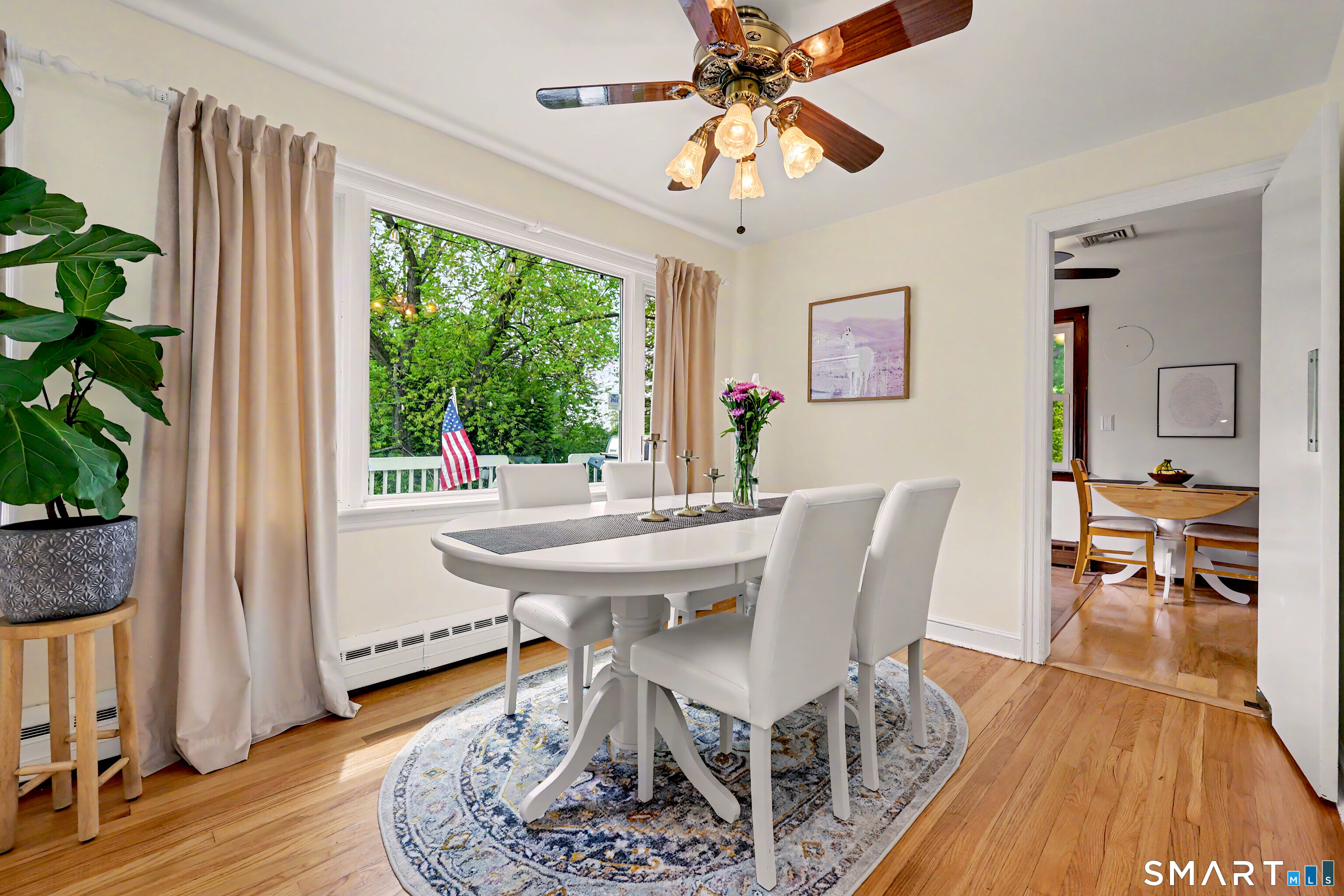 16 Ridgeland Circle Wallingford, CT 06492 - Photo 8 of 30 a view of a dining room with furniture window and wooden floor