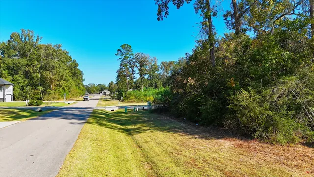 a view of a swimming pool with an outdoor space and seating area