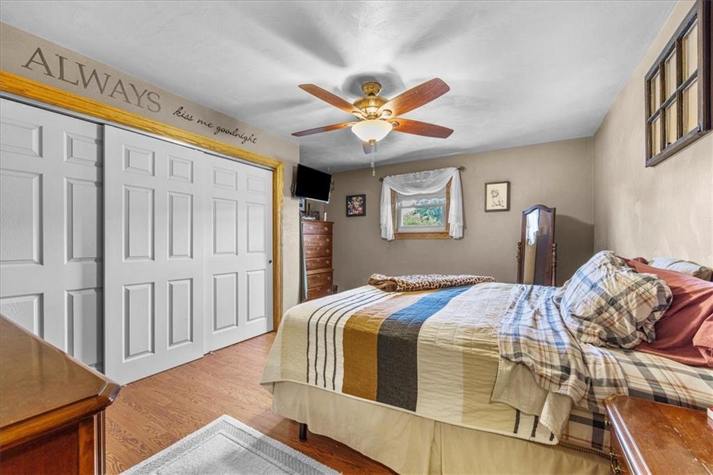 252 Old Plank Road Butler, PA 16002 - Photo 15 of 25 a bedroom with a bed and a window