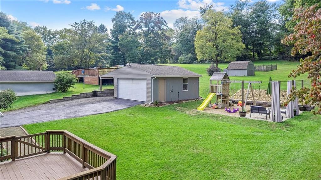 252 Old Plank Road Butler, PA 16002 - Photo 22 of 25 a view of a house with backyard and porch