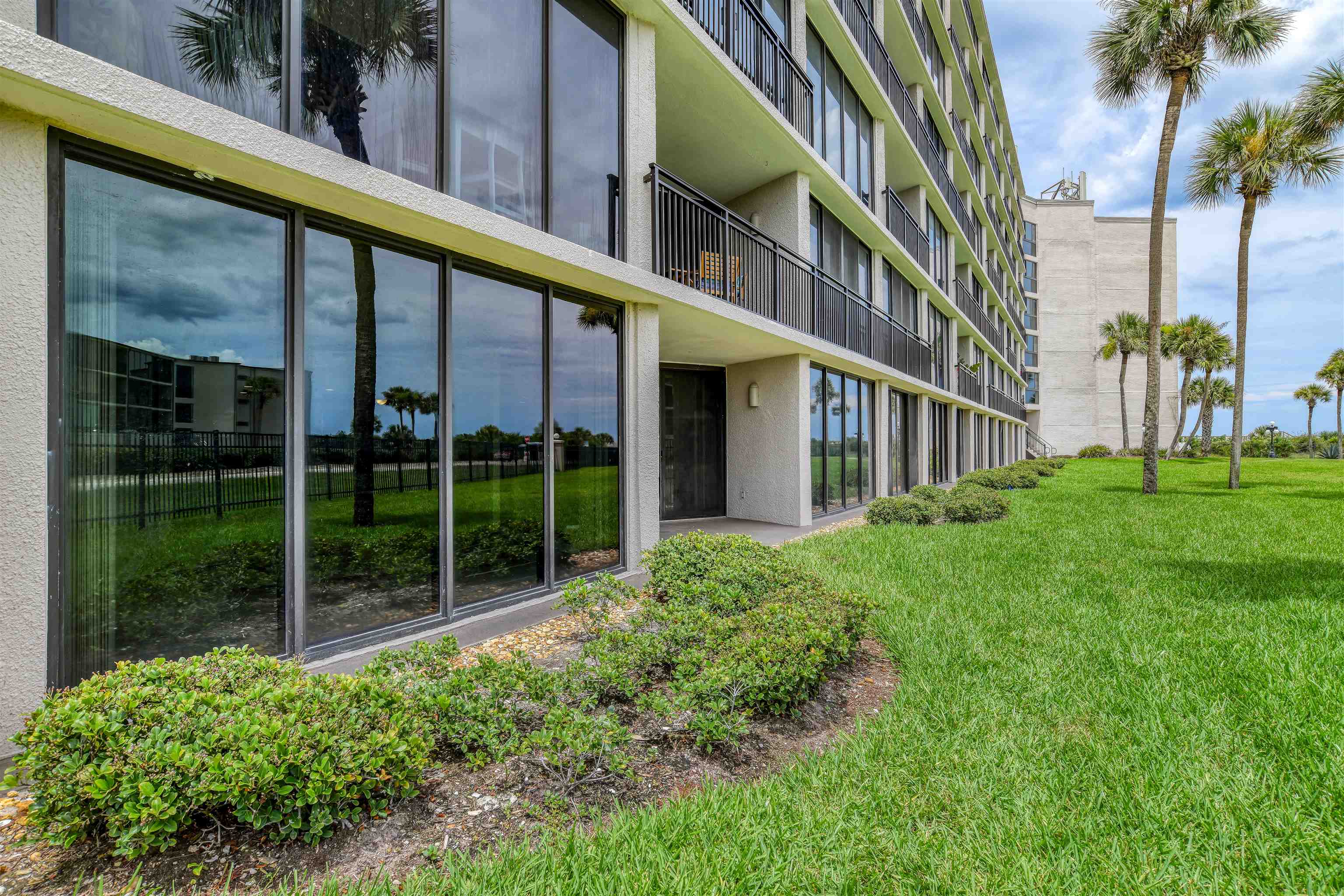 2 Dondanville Road, Unit 101 St. Augustine, FL 32080 - Photo 20 of 50 a view of building with yard