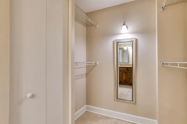 a view of a hallway with a closet