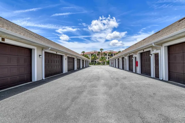 a view of a house with a large space and balcony