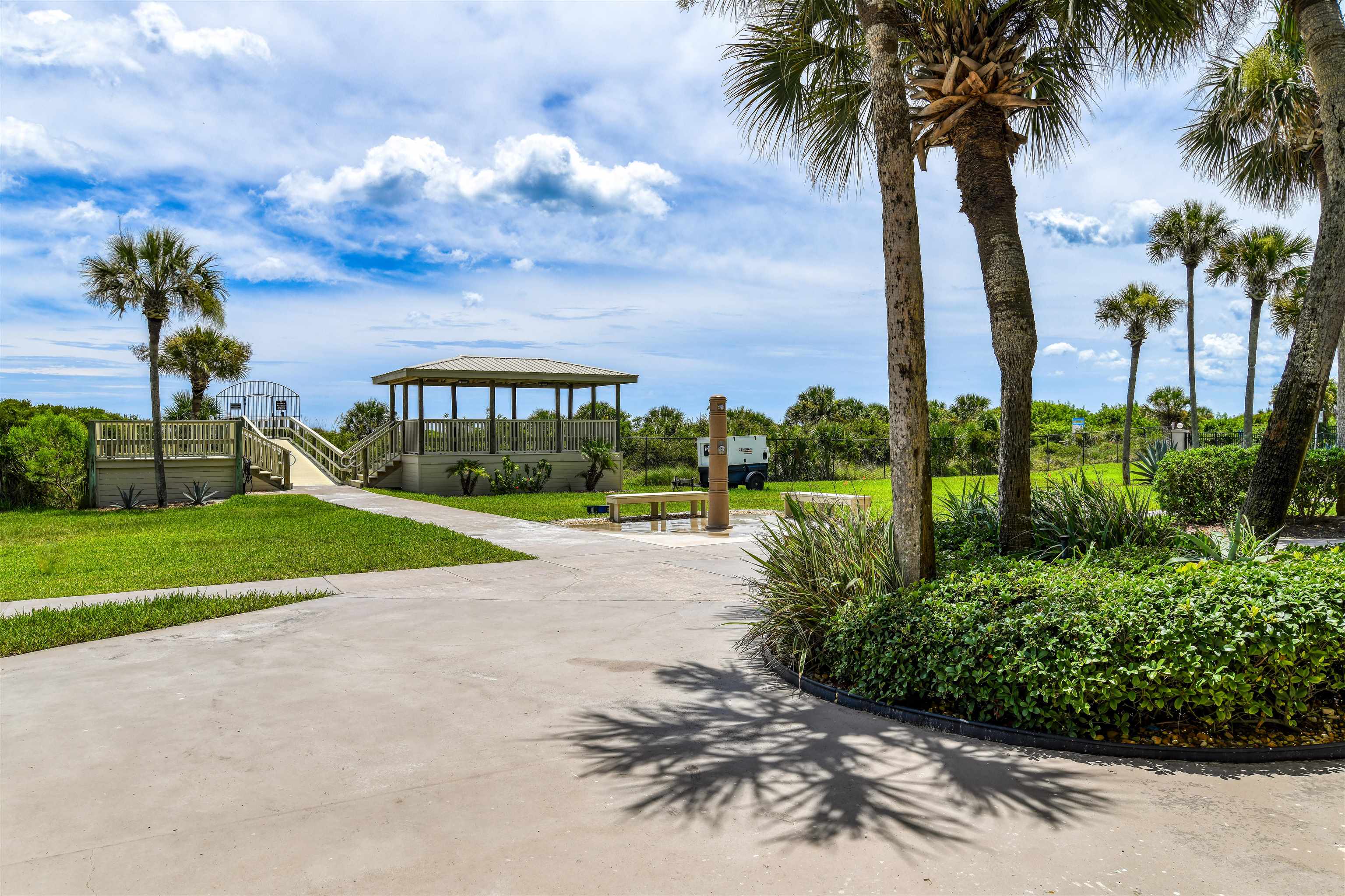 2 Dondanville Road, Unit 101 St. Augustine, FL 32080 - Photo 32 of 50 a view of a garden with palm trees