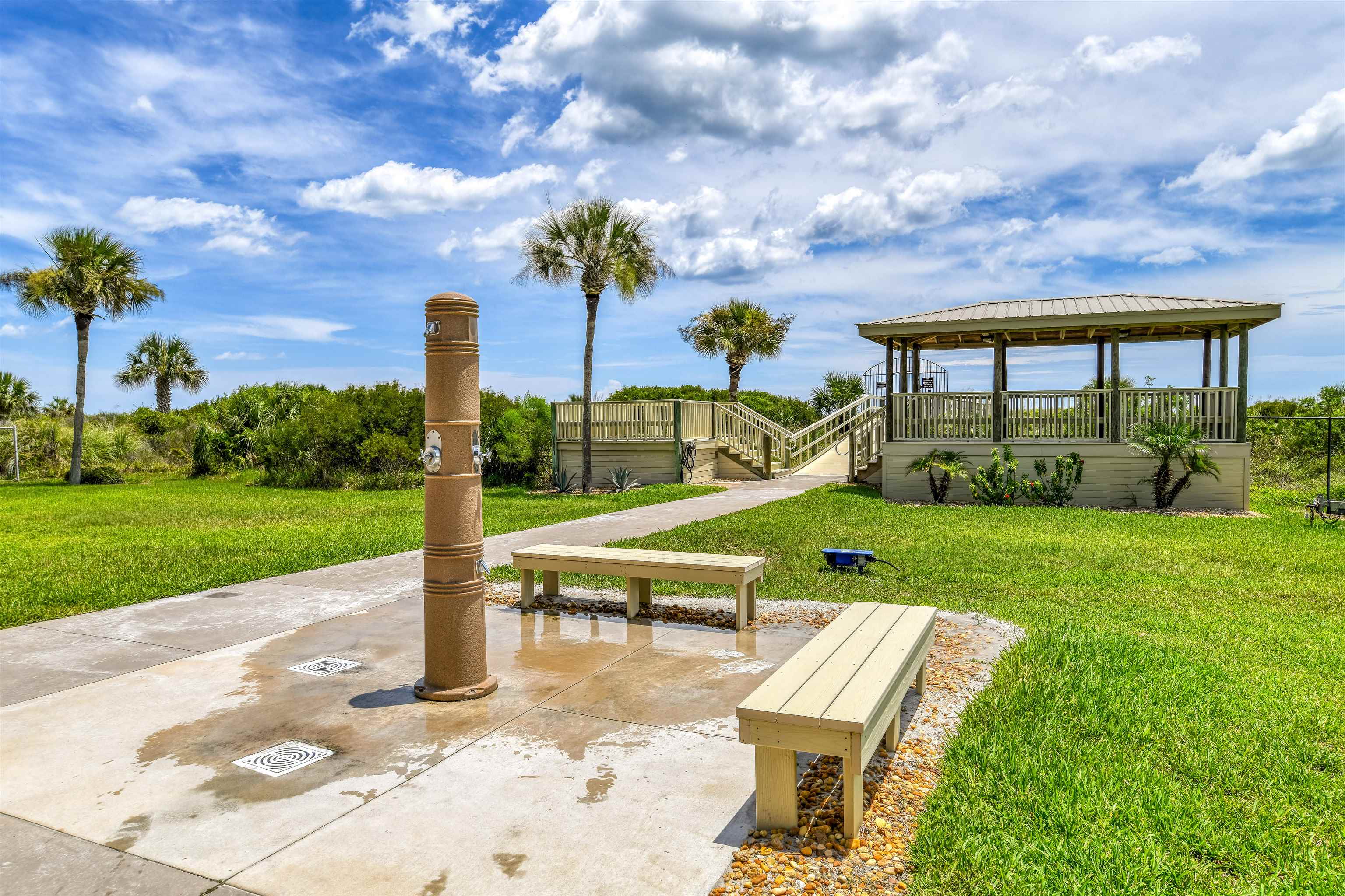 2 Dondanville Road, Unit 101 St. Augustine, FL 32080 - Photo 33 of 50 a view of a garden with sitting area