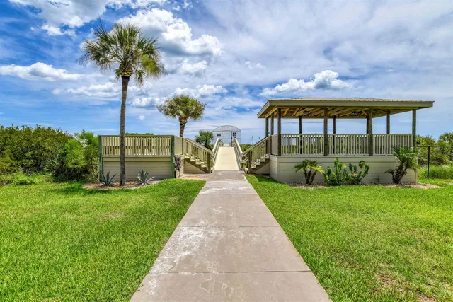 a view of a garden with a slide