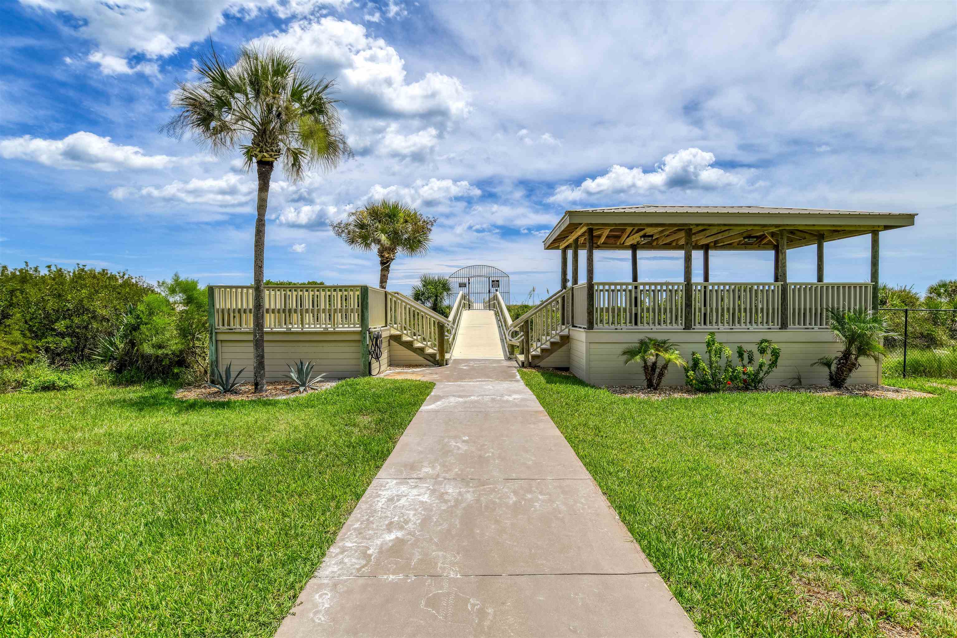 2 Dondanville Road, Unit 101 St. Augustine, FL 32080 - Photo 34 of 50 a view of a garden with a slide