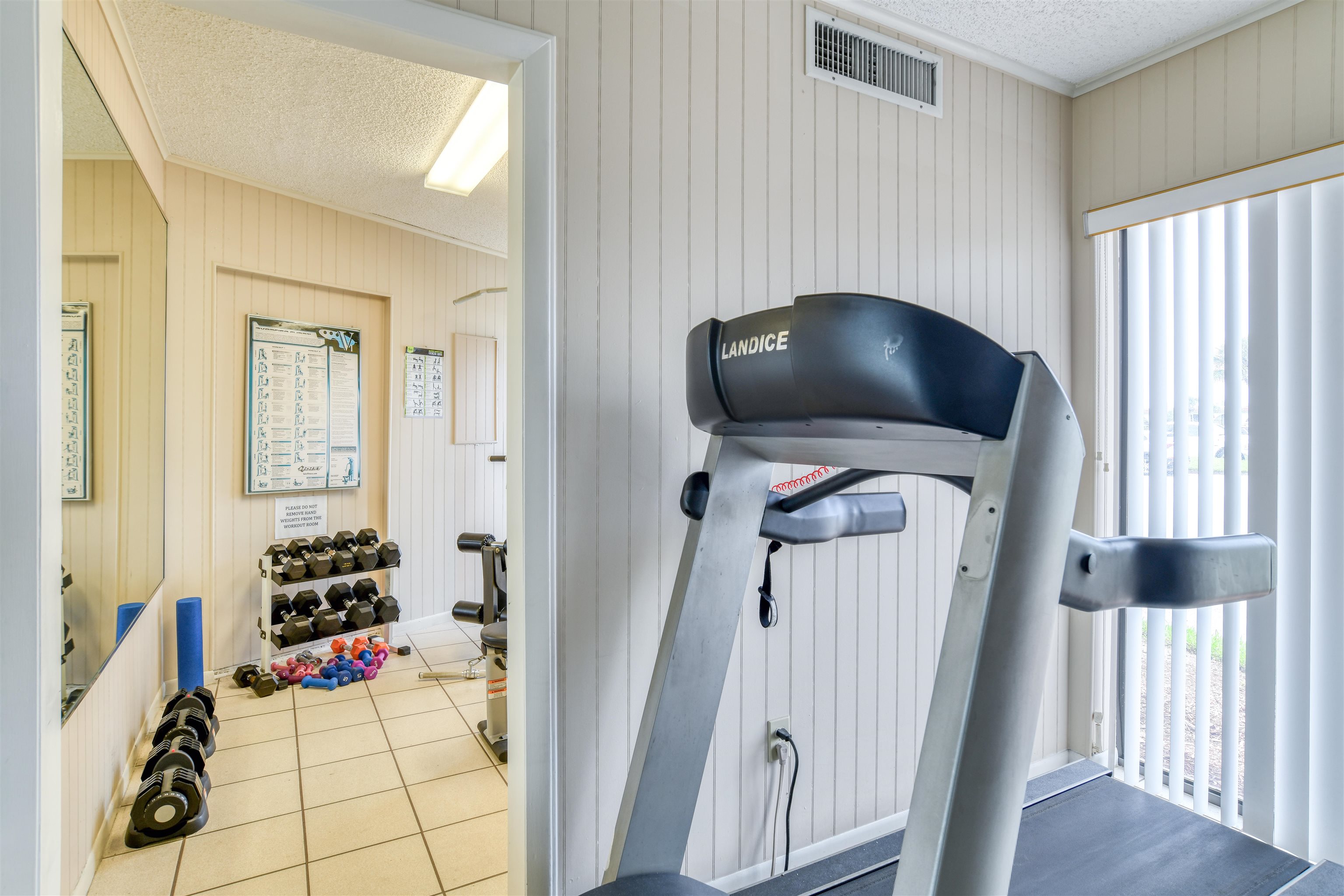 2 Dondanville Road, Unit 101 St. Augustine, FL 32080 - Photo 40 of 50 a living room with furniture and a flat screen tv