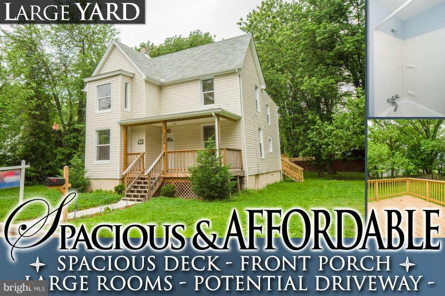 1204 Springfield Avenue Baltimore, MD 21239 - Photo 1 of 28 Exterior (Front)