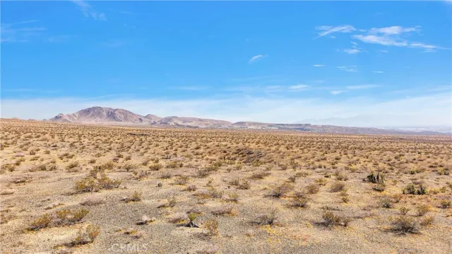 a view of mountain with a lake