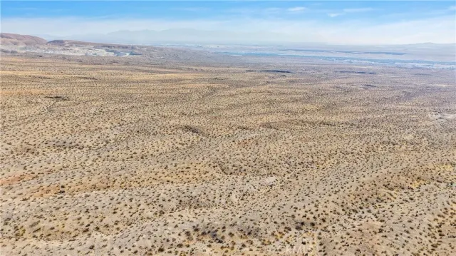 a view of beach and an ocean
