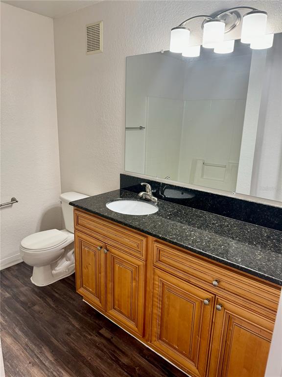 832 Grand Regency Point, Unit 204 Altamonte Springs, FL 32714 - Photo 15 of 19 a bathroom with a sink and a toilet