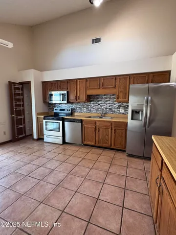 a living room with a rug