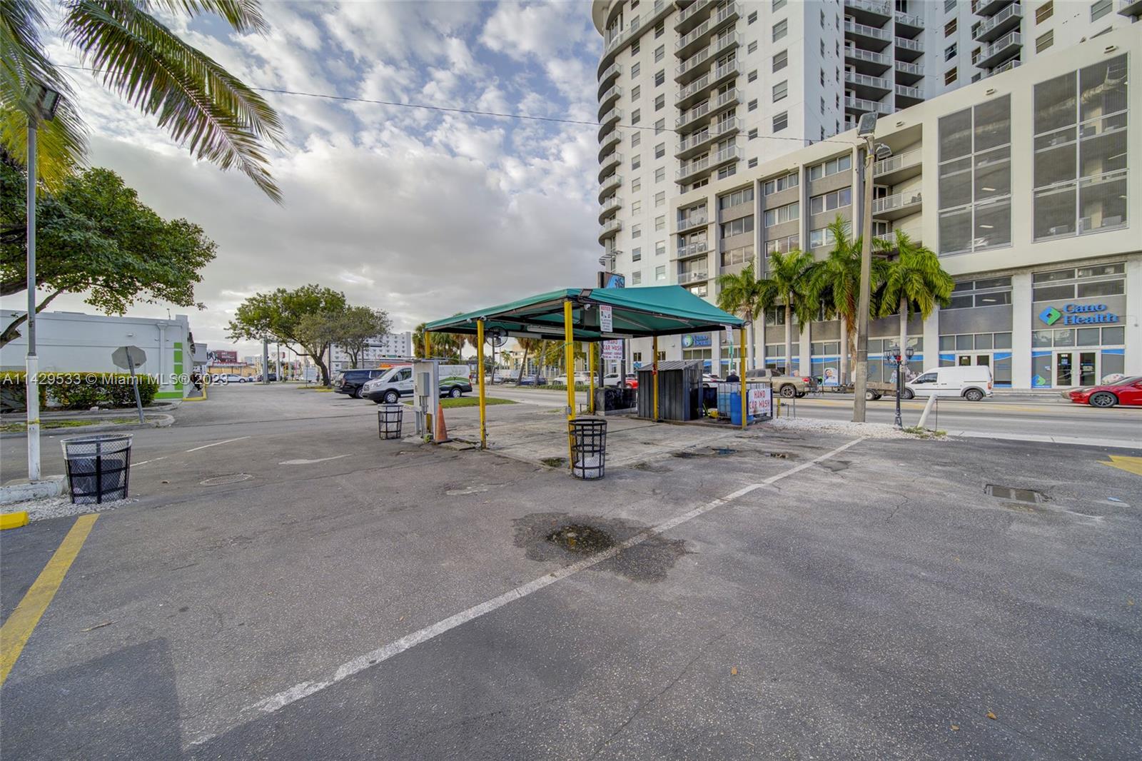 Car Wash For Sale In Miami Miami, FL 33125 - Photo 3 of 19 a view of a street with a building and a street view