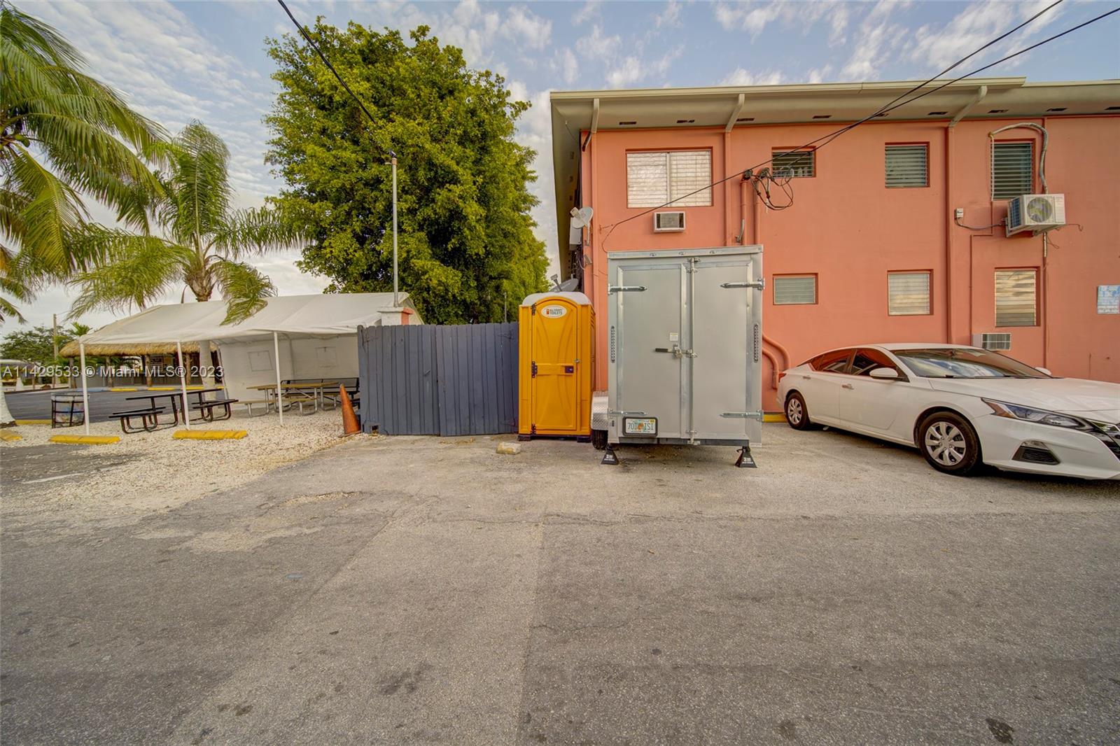 Car Wash For Sale In Miami Miami, FL 33125 - Photo 9 of 19 a view of a car park in front of house
