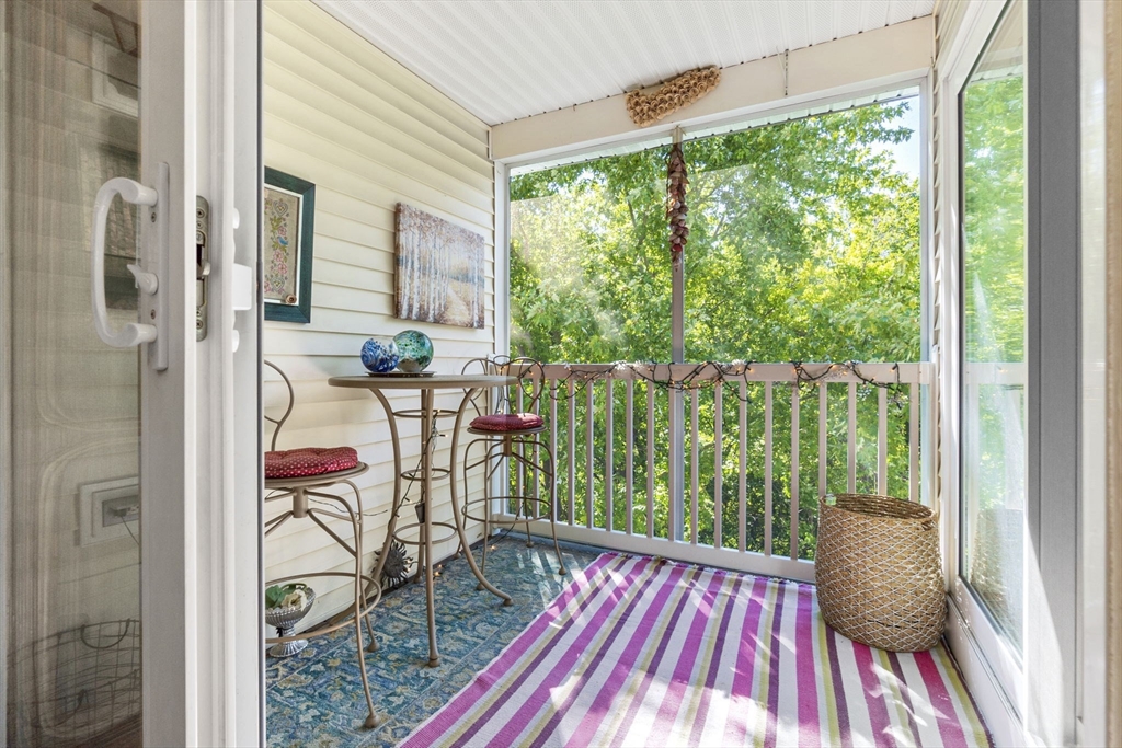 35 Collins Street, Unit 75 Danvers, MA 01923 - Photo 13 of 31 a view of a balcony with chairs