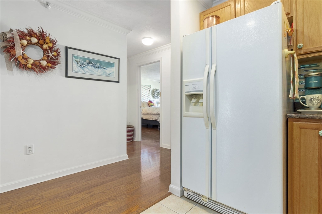 35 Collins Street, Unit 75 Danvers, MA 01923 - Photo 19 of 31 a view of a refrigerator in kitchen and a window