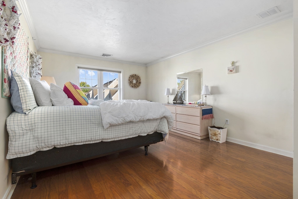 35 Collins Street, Unit 75 Danvers, MA 01923 - Photo 22 of 31 a bedroom with bed and window