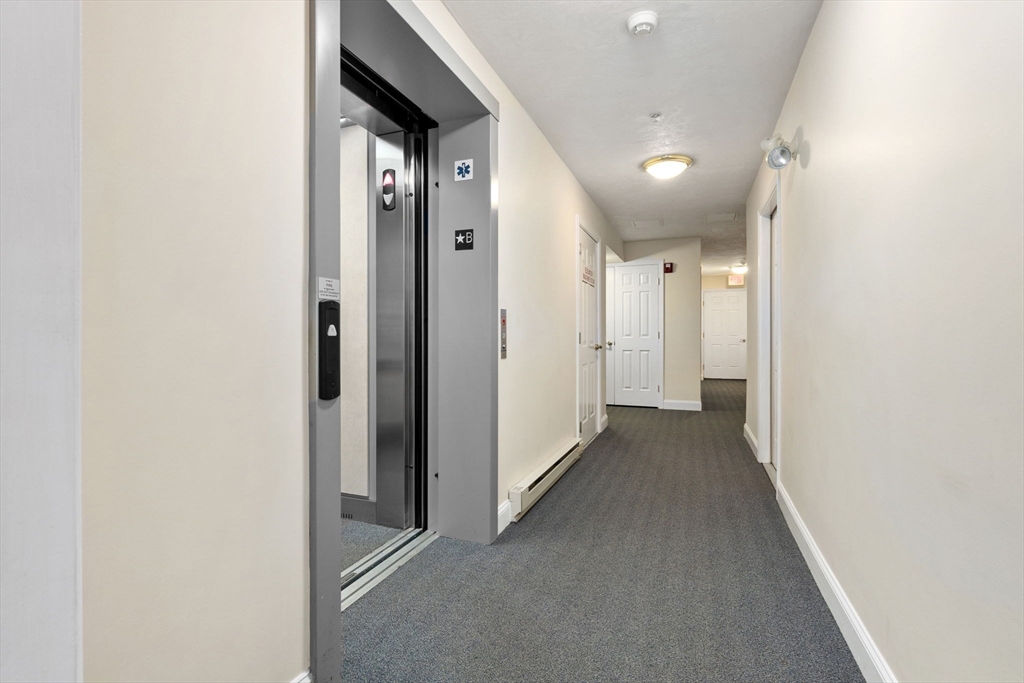 35 Collins Street, Unit 75 Danvers, MA 01923 - Photo 30 of 31 a view of a hallway