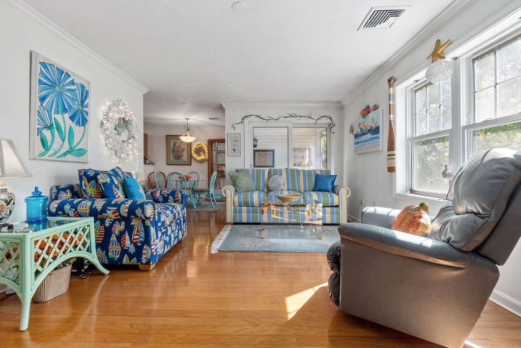 35 Collins Street, Unit 75 Danvers, MA 01923 - Photo 6 of 31 a living room with furniture and a large window