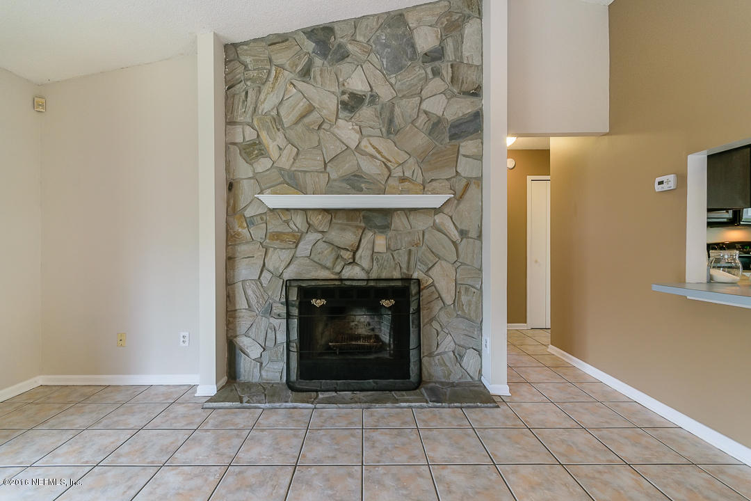 8450 Ivey Road Jacksonville, FL 32216 - Photo 6 of 20 wood burning fireplace