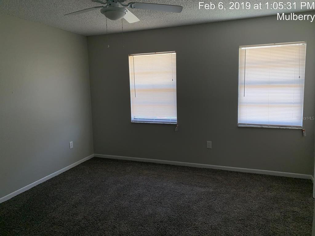 181 Diesel Road Mulberry, FL 33860 - Photo 7 of 9 an empty room with a window