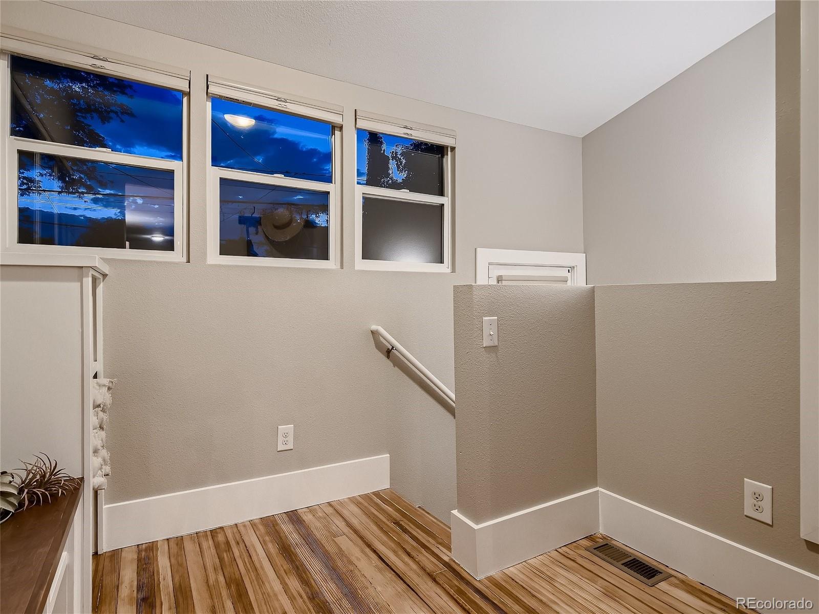 1031 Harrison Street Denver, CO 80206 - Photo 27 of 32 a view of wooden floor in a room