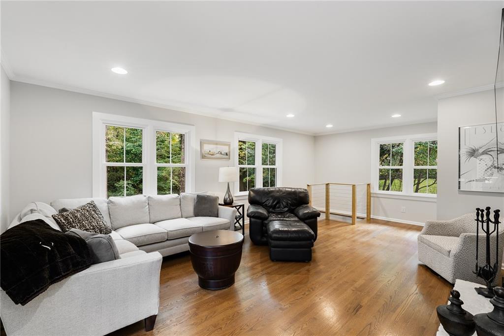 6555 Wright Road Northeast Sandy Springs, GA 30328 - Photo 13 of 40 a living room with furniture and a large window