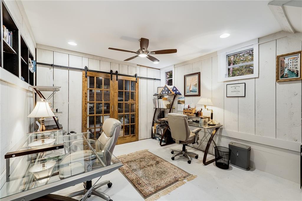 6555 Wright Road Northeast Sandy Springs, GA 30328 - Photo 16 of 40 a view of a workspace with furniture and a window