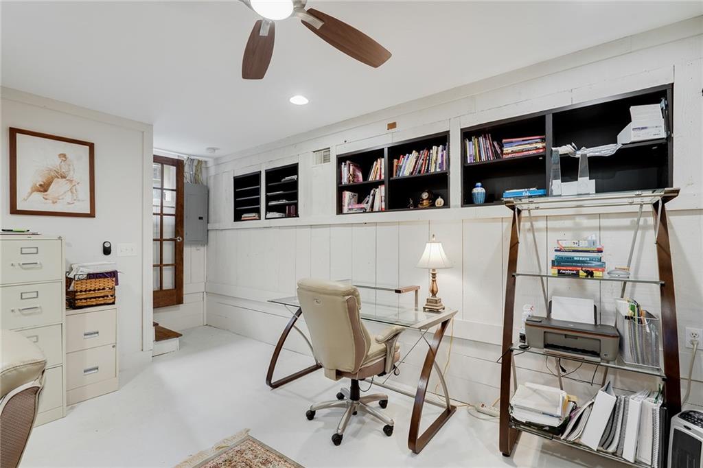 6555 Wright Road Northeast Sandy Springs, GA 30328 - Photo 17 of 40 a view of a livingroom with furniture and windows