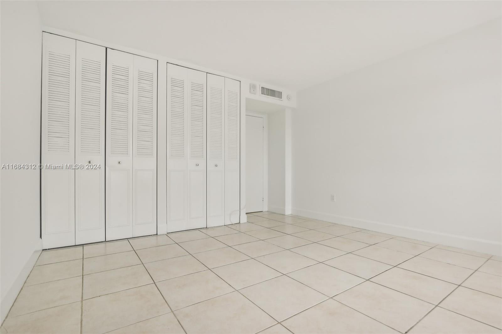 550 Ocean Drive, Unit 9F Key Biscayne, FL 33149 - Photo 12 of 37 a view of a closet area