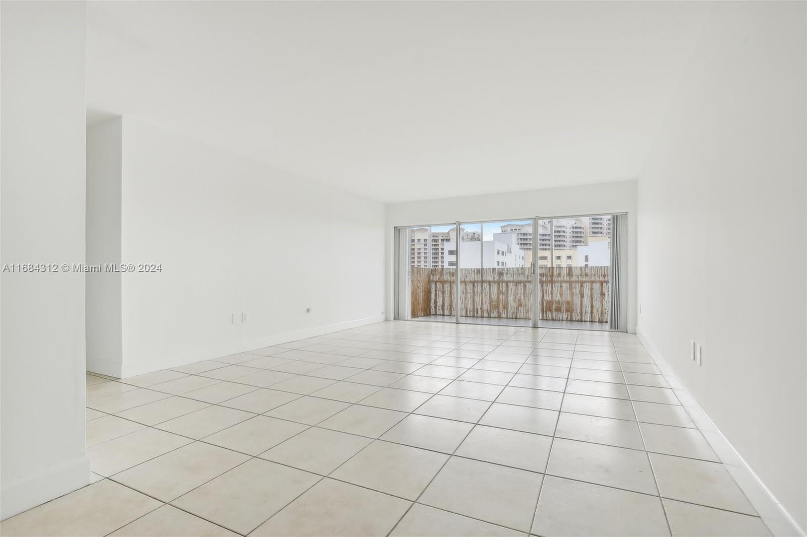 550 Ocean Drive, Unit 9F Key Biscayne, FL 33149 - Photo 24 of 37 a view of an empty room with a window