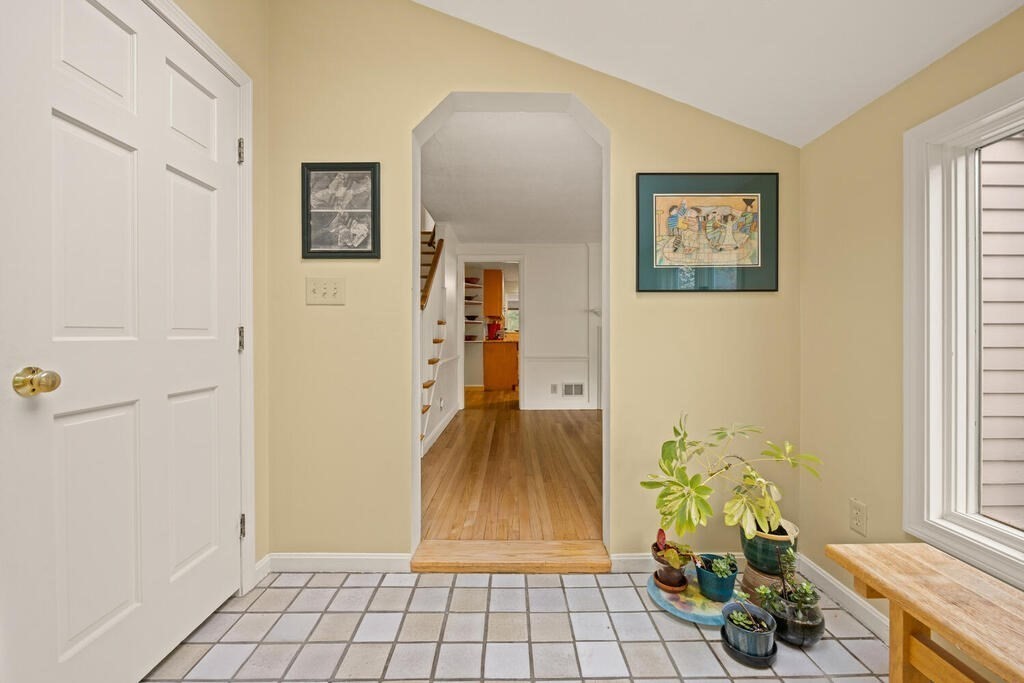 22 Spring Street Lexington, MA 02421 - Photo 3 of 35 a view of an entryway with wooden floor