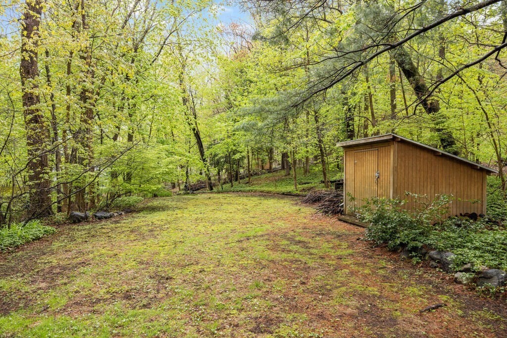 22 Spring Street Lexington, MA 02421 - Photo 33 of 35 a view of a backyard of the house