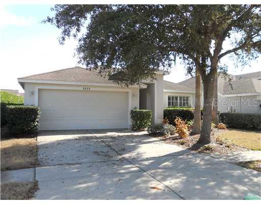 5635 Rockfield Loop Valrico, FL 33596 - Photo 1 of 1 a view of a house with a patio