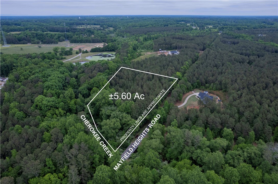 0 Mayfield Heights Road Belton, SC 29627 - Photo 1 of 6 This aerial view showcases a verdant lot, ideal for a private estate amidst nature's embrace.