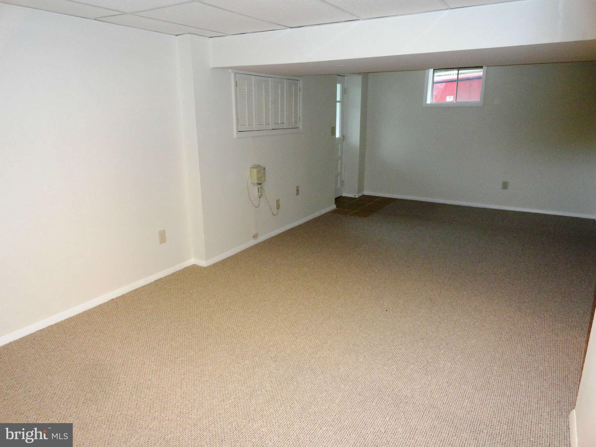 512 Shipley Road Linthicum Heights, MD 21090 - Photo 18 of 30 Lower level family room with new Berber carpet