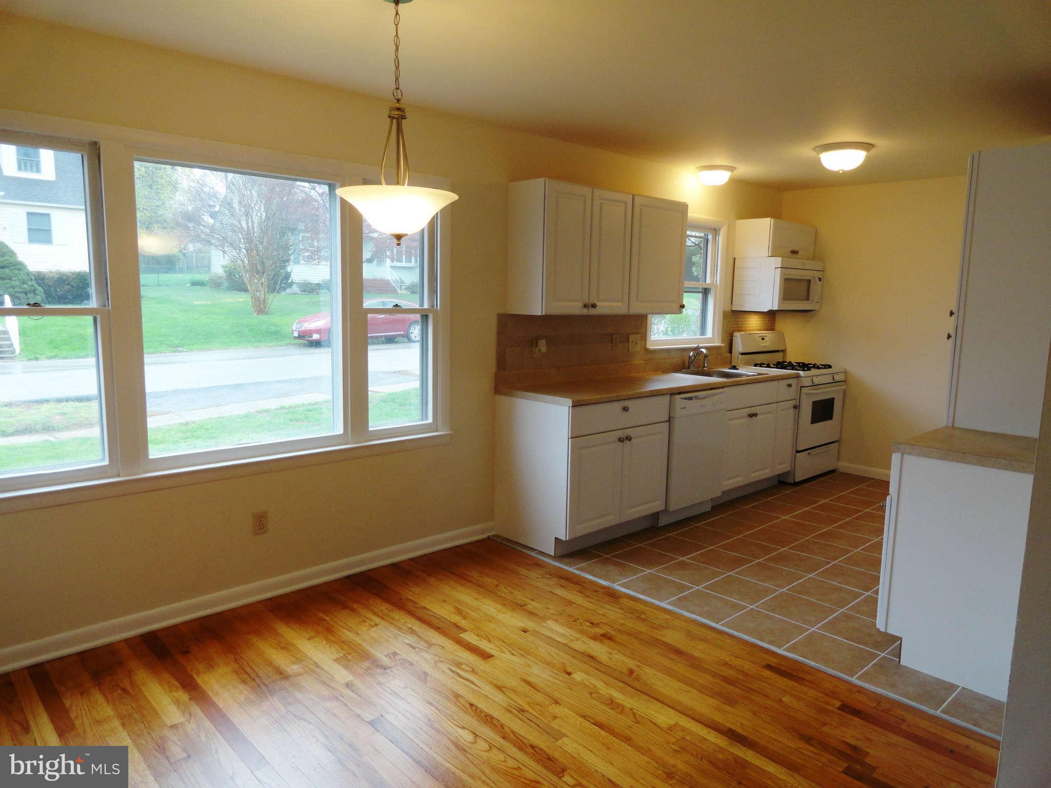 512 Shipley Road Linthicum Heights, MD 21090 - Photo 4 of 30 Kitchen opens to dining room area